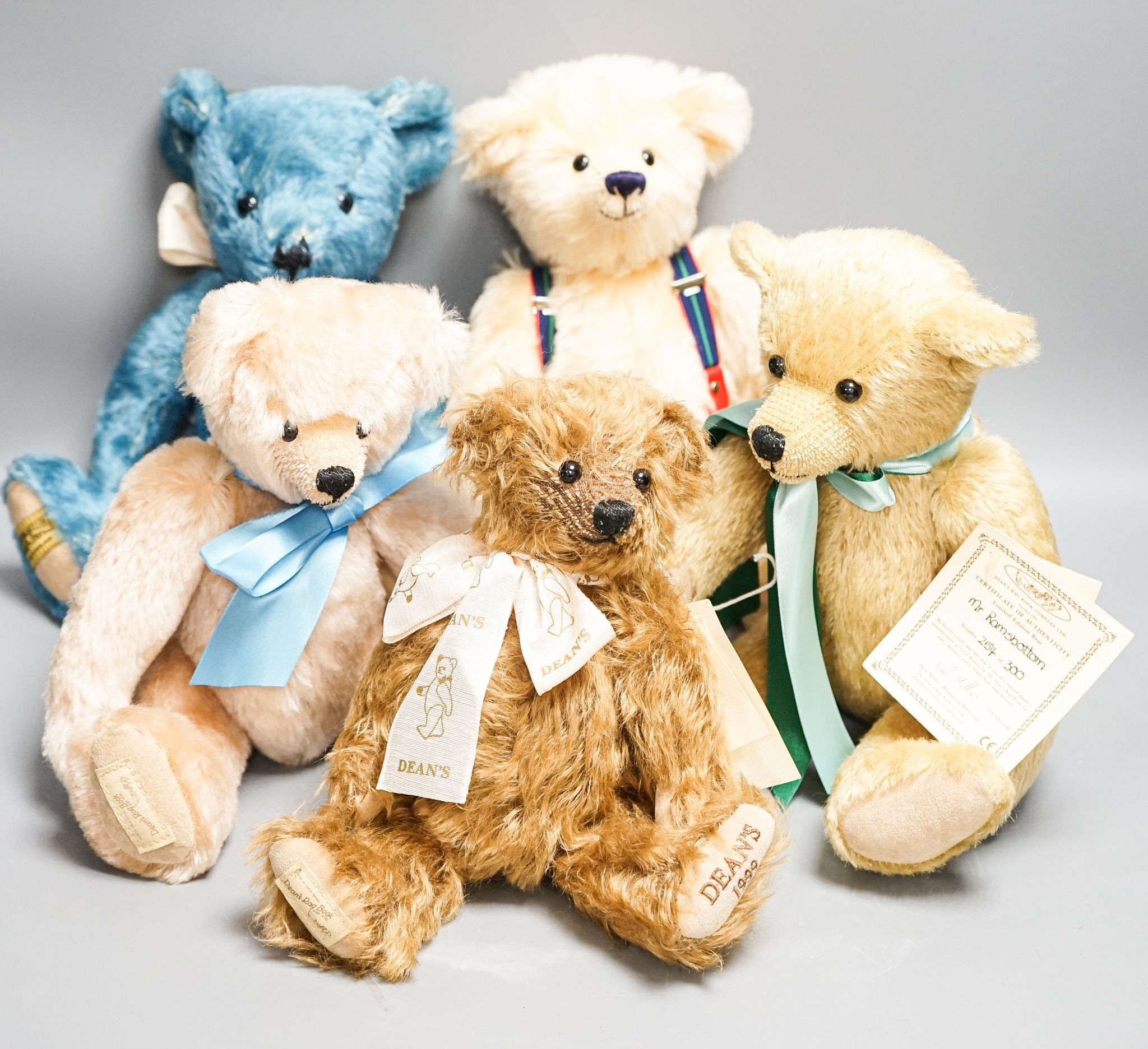 Four Deans Bears with certificates and one Merrythought